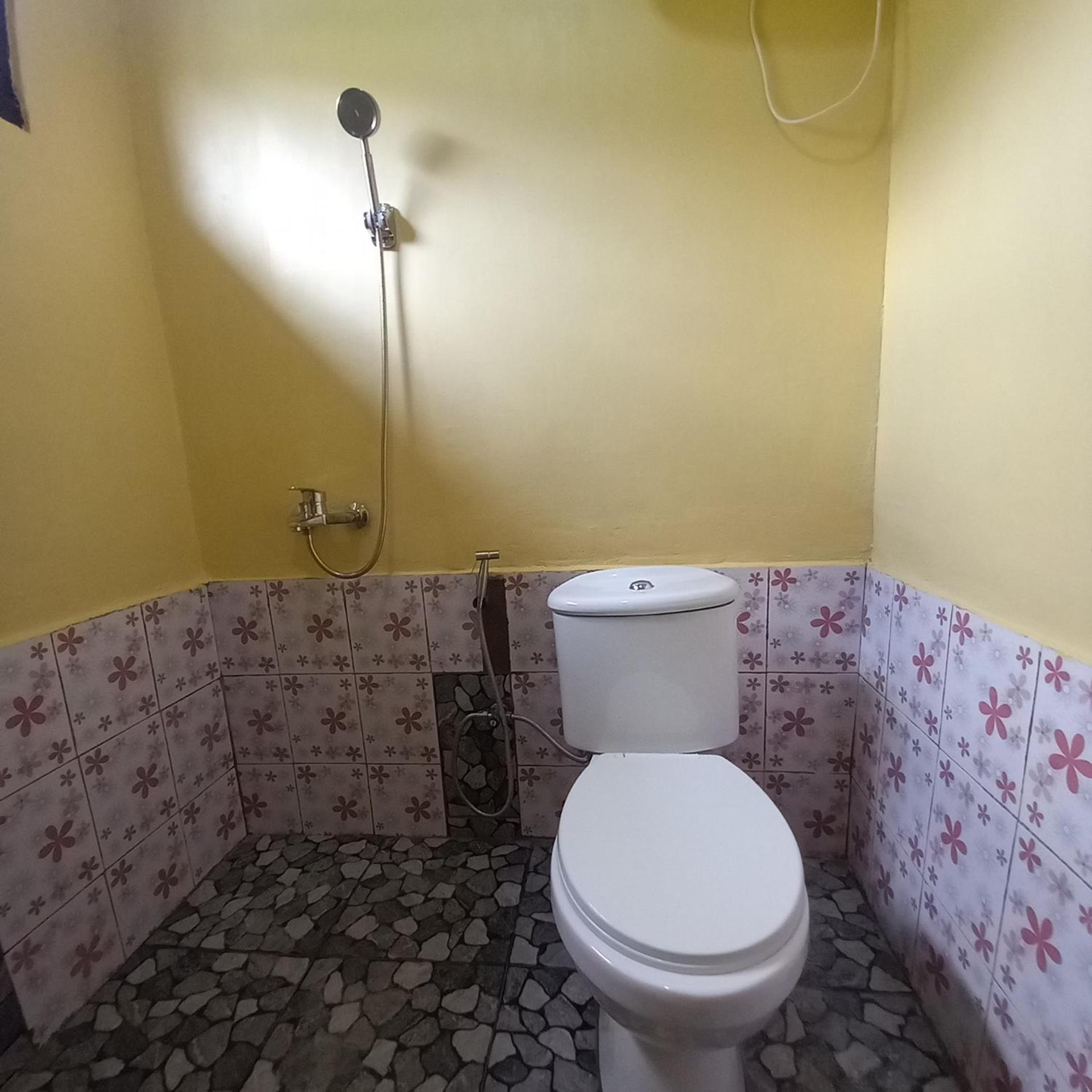 Tange Guest House Ruteng Rum bild